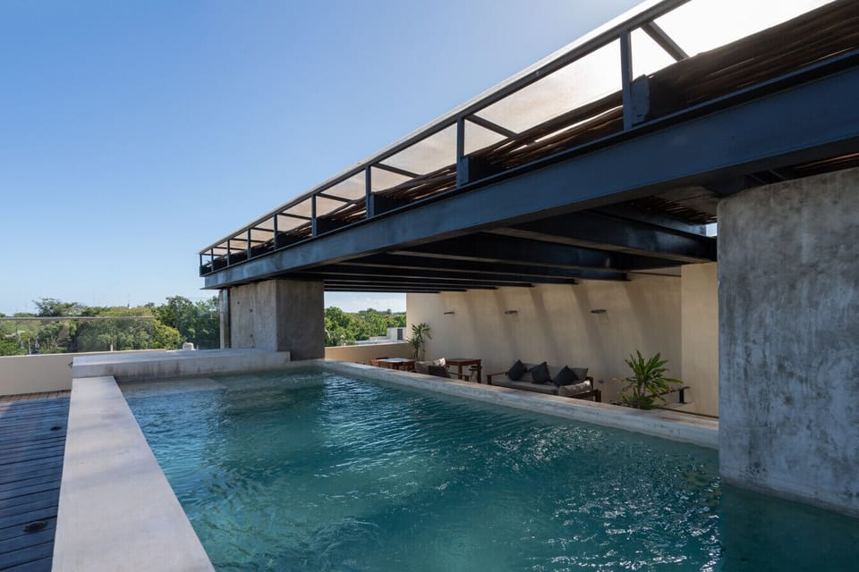 Vibrant rooftop pool perfect for relaxing under the sun.