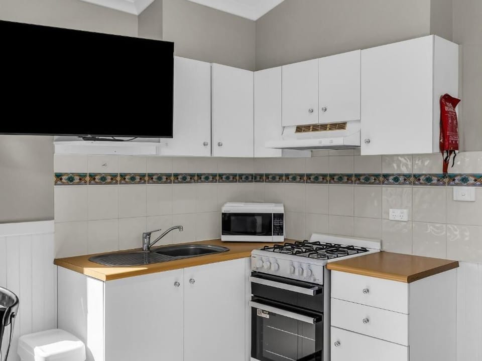 Standard 1 Bedroom Cabin | Private kitchen | Microwave, stovetop, toaster