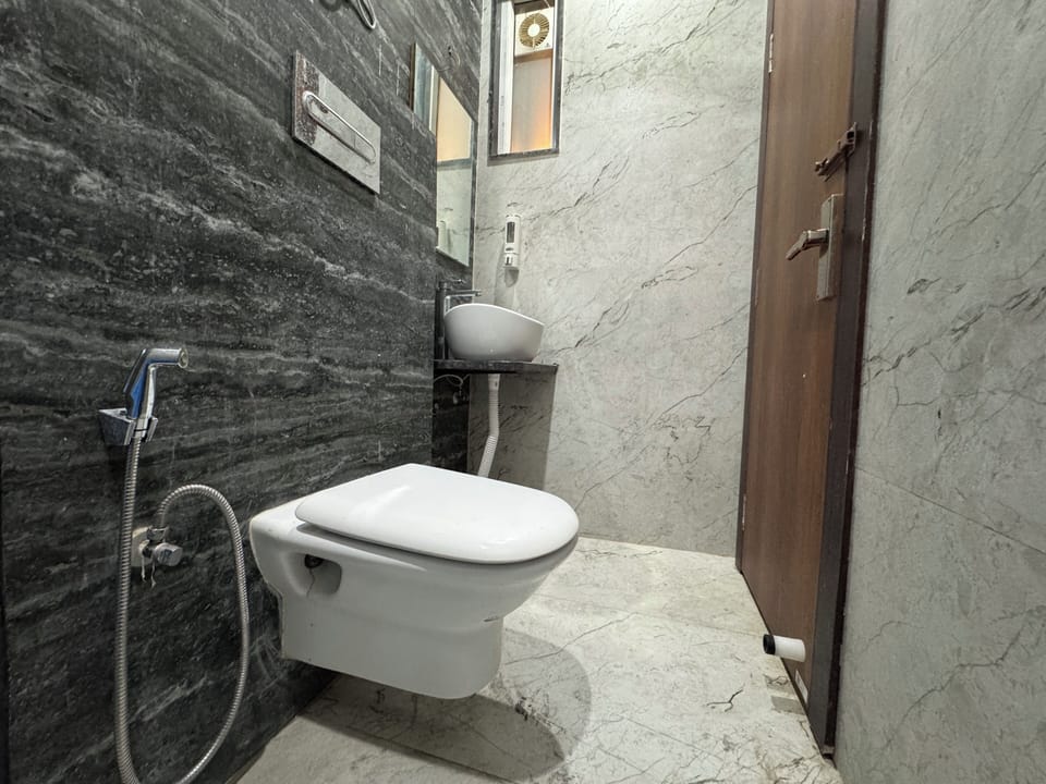 Shower, slippers, towels, soap