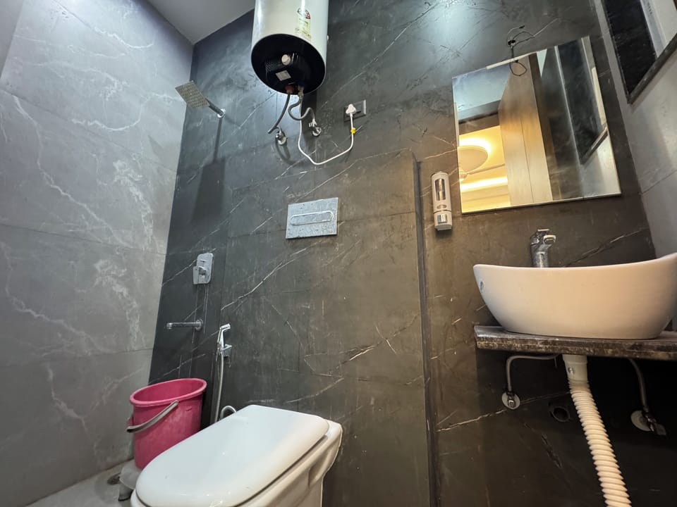 Shower, slippers, towels, soap