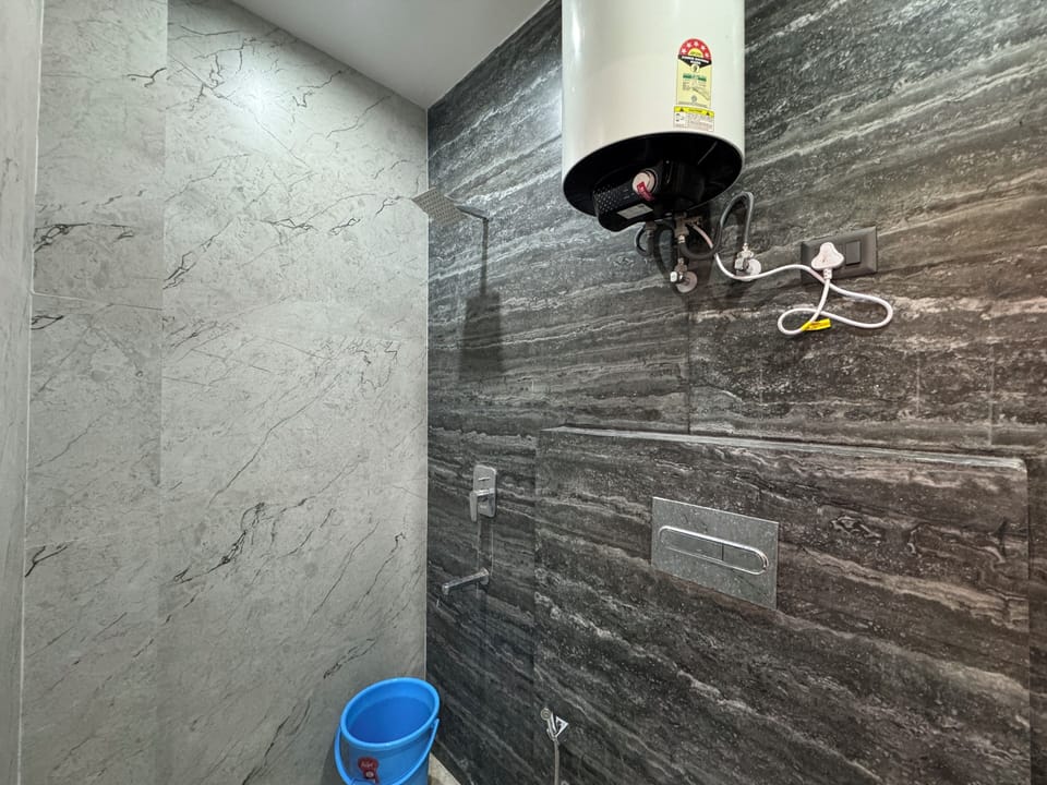 Shower, slippers, towels, soap