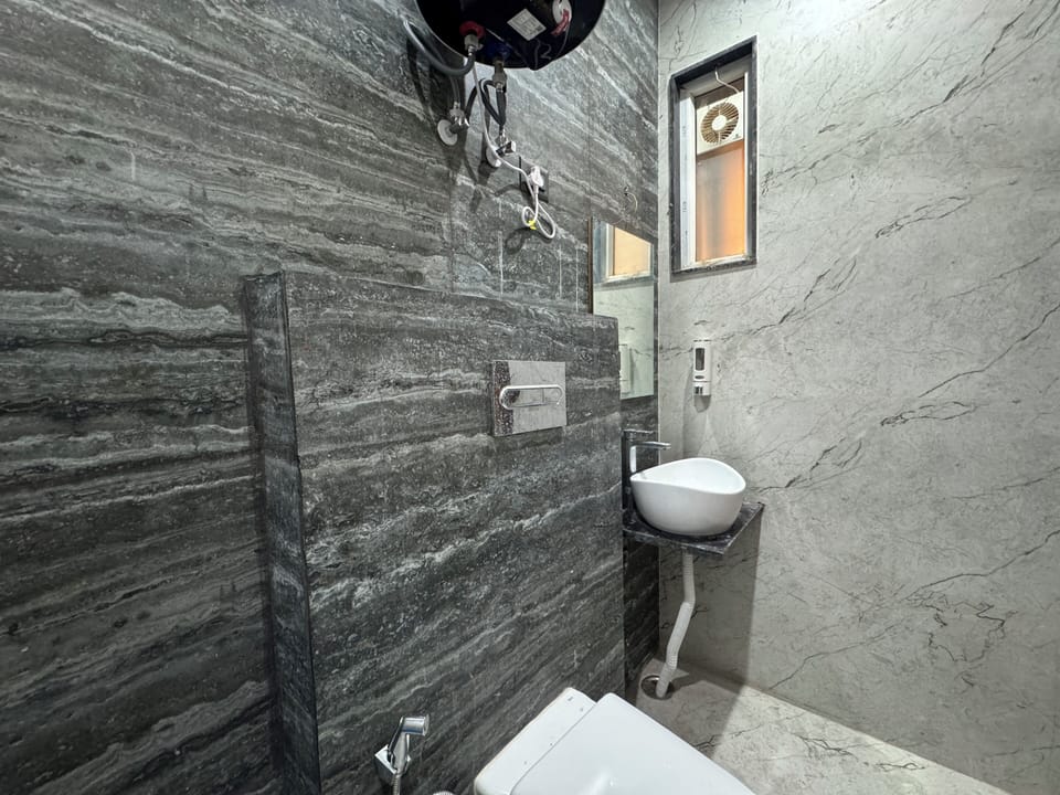 Shower, slippers, towels, soap