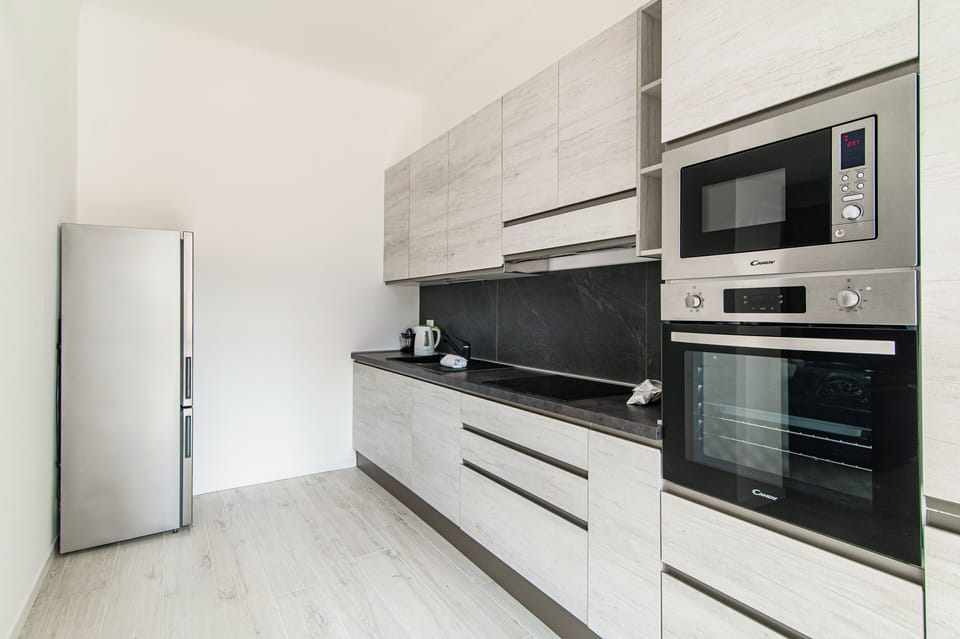Apartment | Private kitchen | Full-size fridge, microwave, oven, stovetop