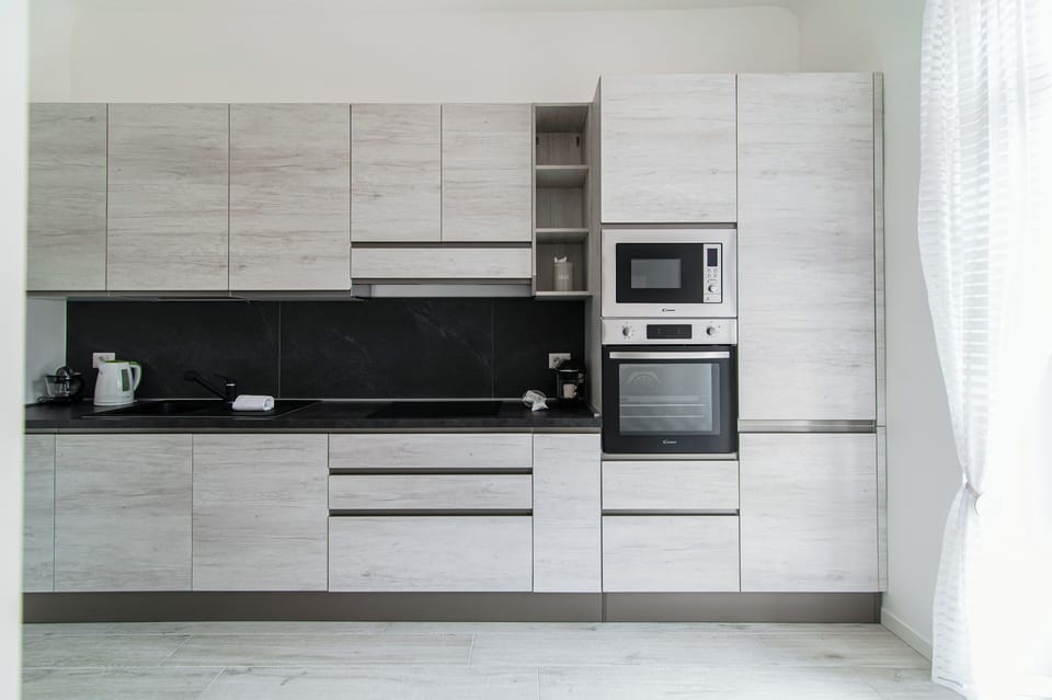 Apartment | Private kitchen | Full-size fridge, microwave, oven, stovetop