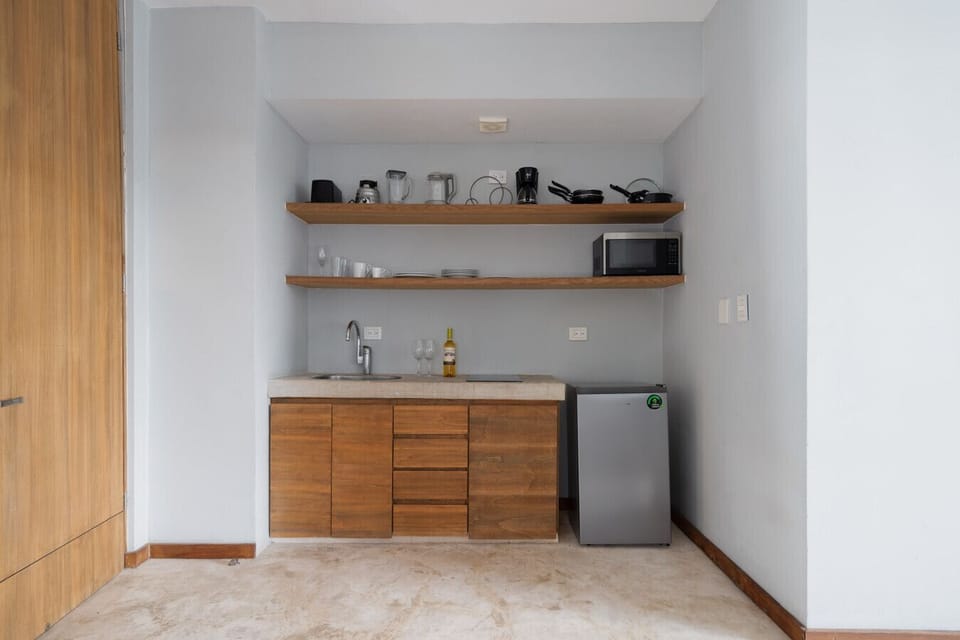 Compact, fully equipped kitchen for convenient and enjoyable cooking.