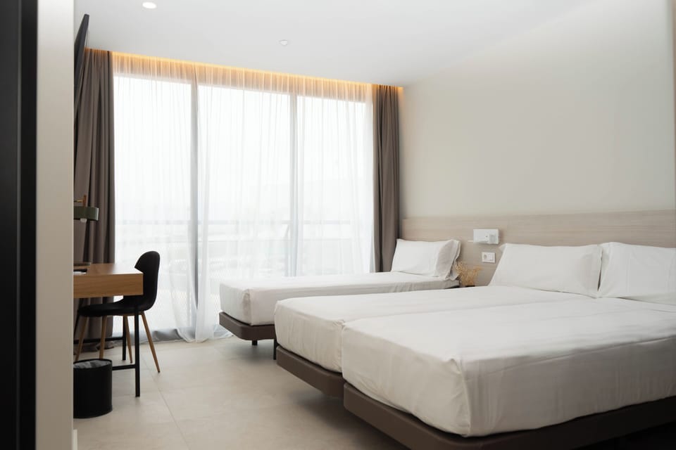 Standard Triple Room, City View | Individually decorated, individually furnished, desk, laptop workspace
