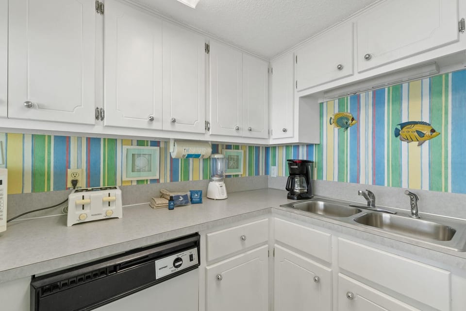 Condo, 1 King Bed with Sofa bed (Island Winds East Unit 704) | Private kitchen | Oven, toaster