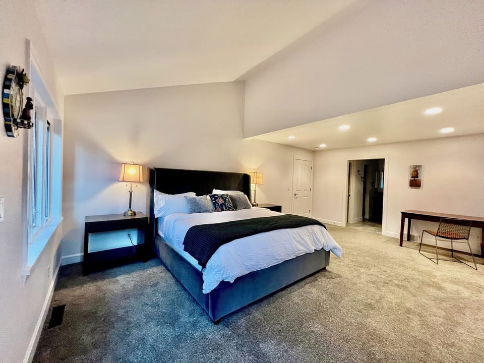 Grande main floor primary bedroom, King bed, work space, full ensuite bath