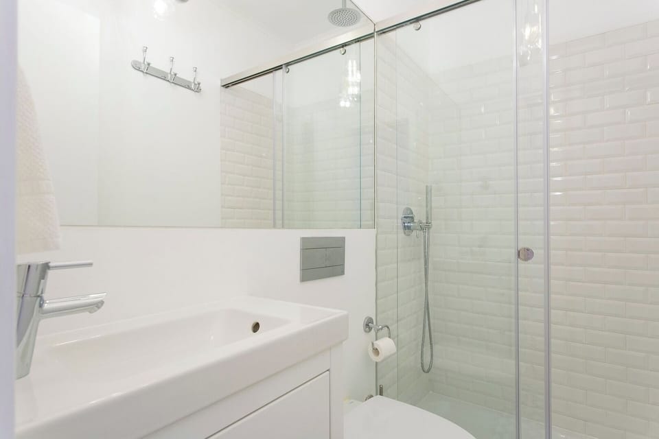 Light blue tiles complete Bathroom!