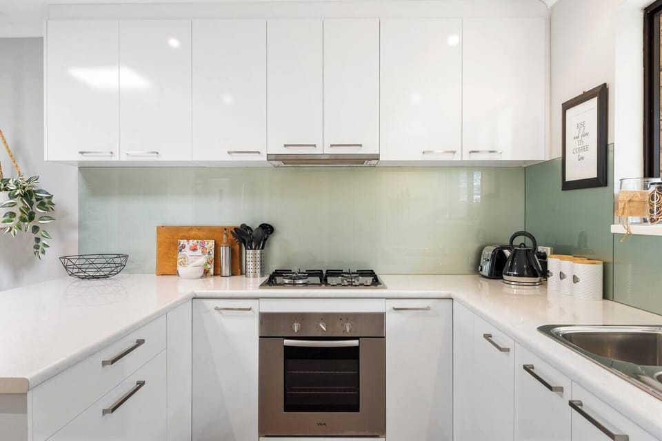 A full kitchen with gas cooking, oven, dishwasher, microwave, kettle, toaster, coffee and all the essentials supports effortless meal preparation.