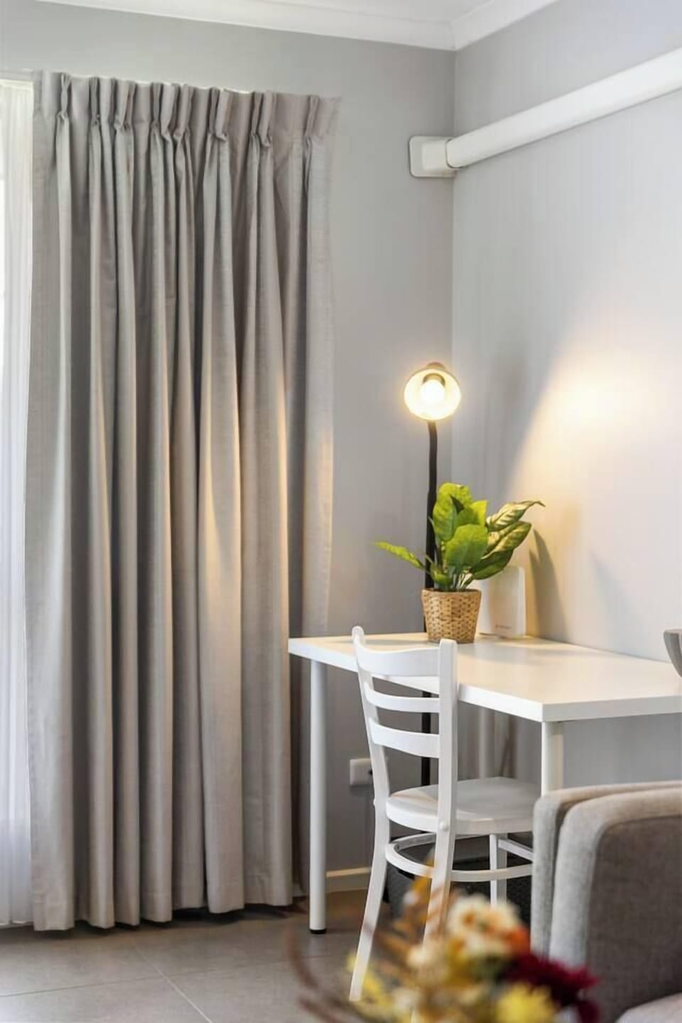 A dedicated workspace beside a large window supports focused tasks with reliable Wi-Fi and a calm setting for remote work or planning your days.