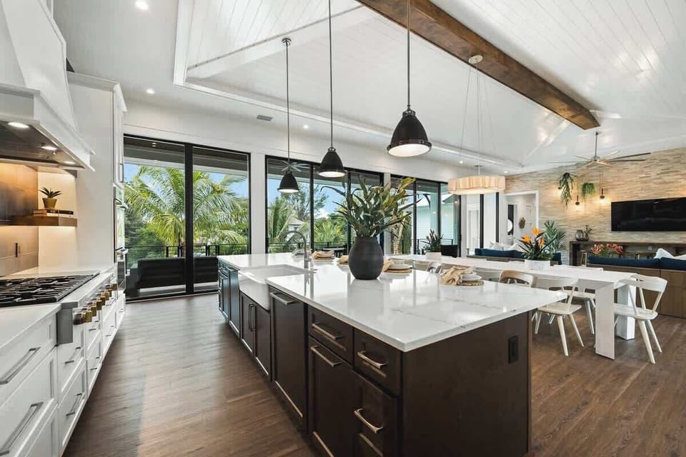 House A - Great Room - Open Floor Plan - Fully Stocked Kitchen, Dining for 10 and Bar seating for 5 - Balcony Access - Lake Views