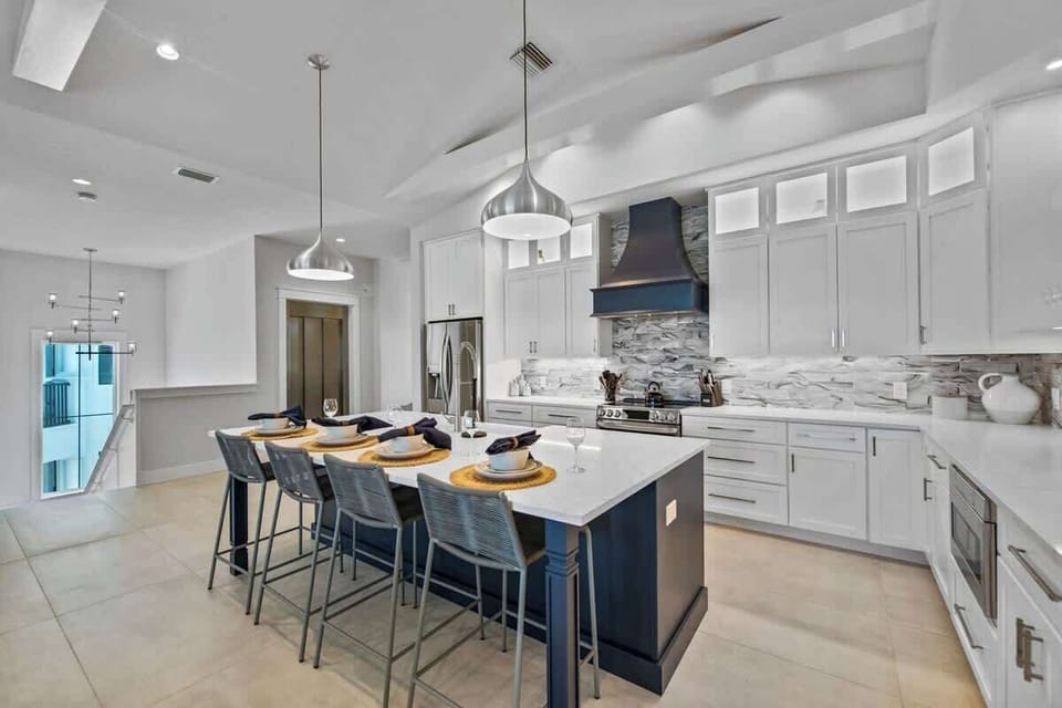 House A - Kitchen - Oversized Refrigerator -  Dishwasher - Oven - Large Gas Stove - Bar Seating for 4