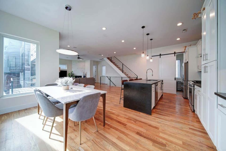 Fully equipped kitchen with space to cook, dine, or enjoy takeout together