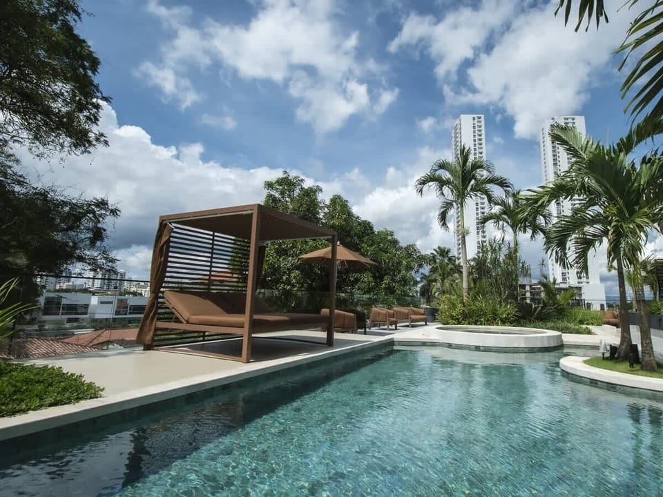 Shared pool with lounge and chairs