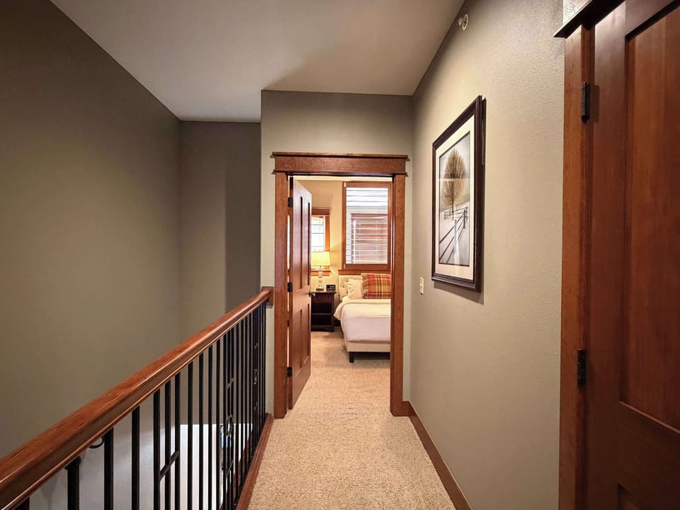 Hallway to the first ensuite offering optimal privacy