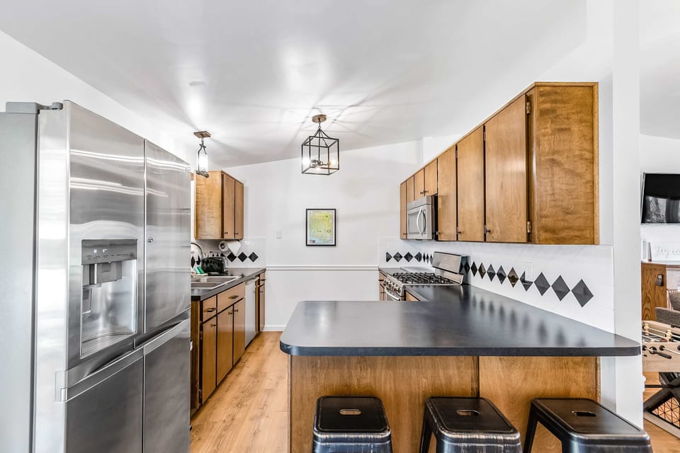 Fully equipped kitchen provides all the necessities to stay in and make a meal together. 