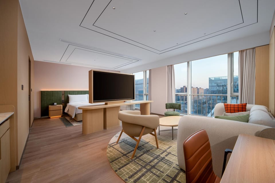 Premium Room, 1 King Bed | Living area | TV
