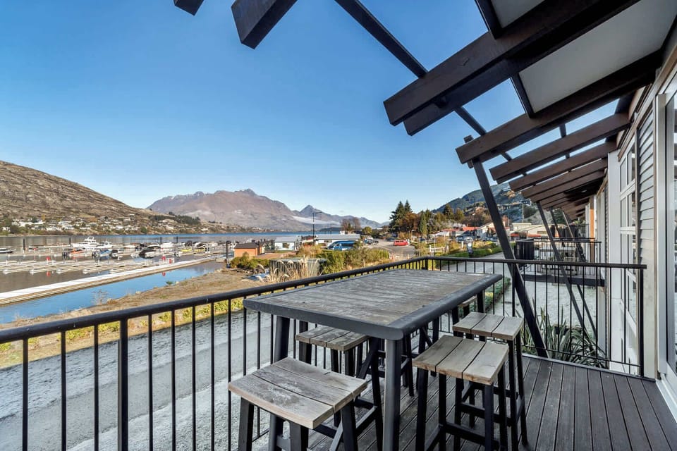Watch the boats drift by from your private deck.