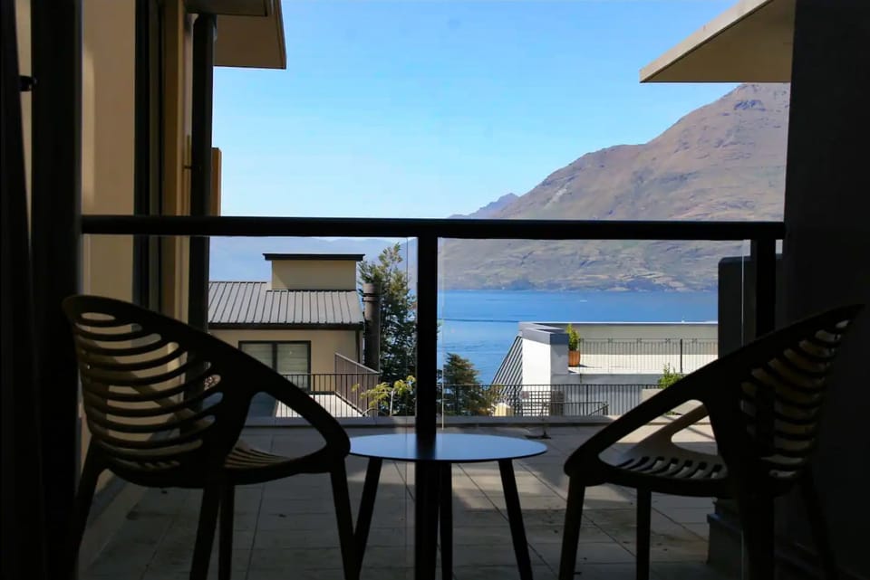 Private balcony with lake views — the perfect spot for morning coffee or a sunset drink overlooking Queenstown’s stunning scenery.