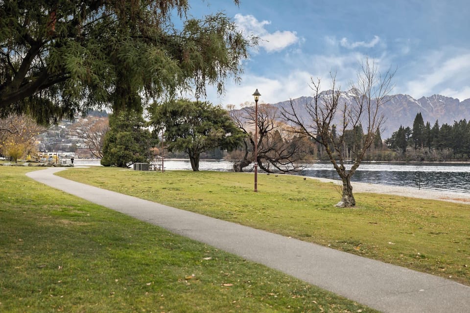 Lakeside walking path nearby, perfect for a relaxed stroll along the water.