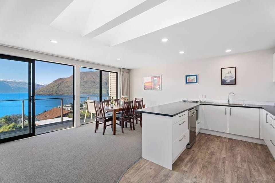 Spacious open-plan layout combining kitchen, dining, and living areas