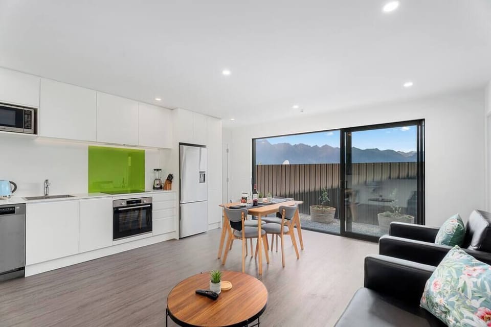 A very large and spacious open plan lounge, dining and kitchen area.