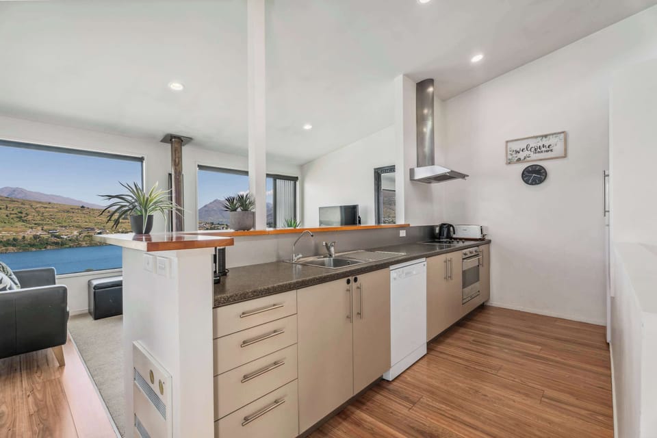 Large, galley style kitchen with wonderful views and lots of natural light
