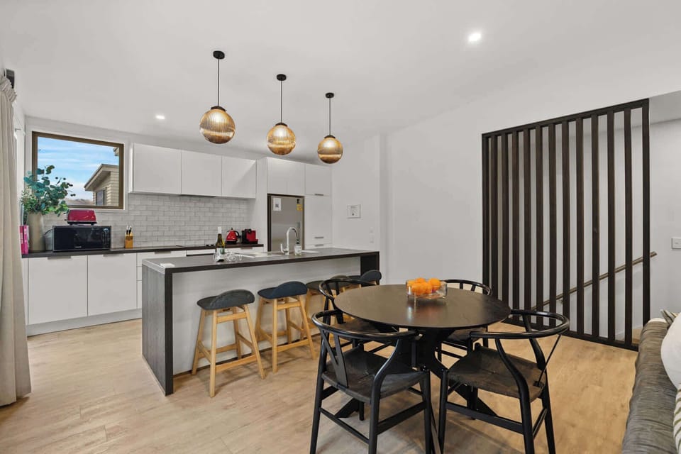 Dining area and kitchen designed for shared meals and conversation
