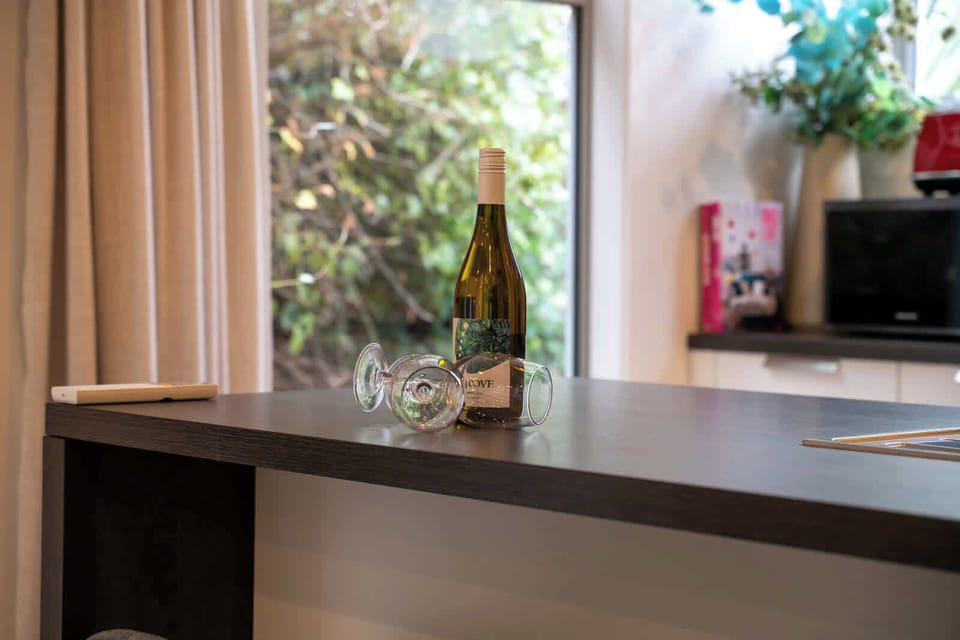 The Hello Queenstown touch – wine and glasses ready for your arrival