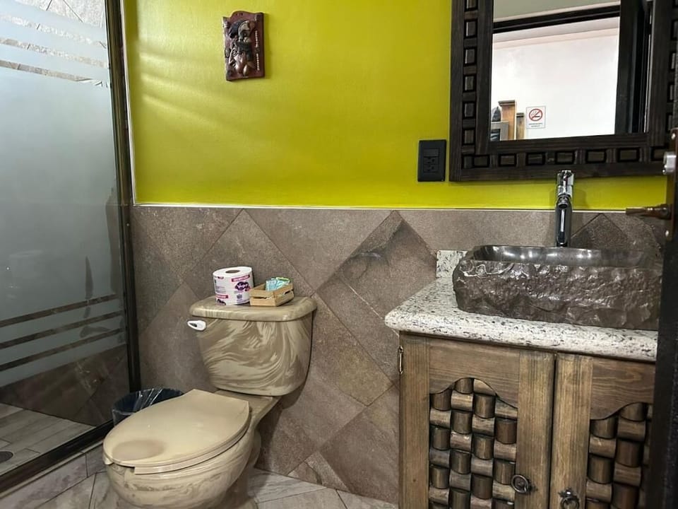 Shower, rainfall showerhead, towels, soap