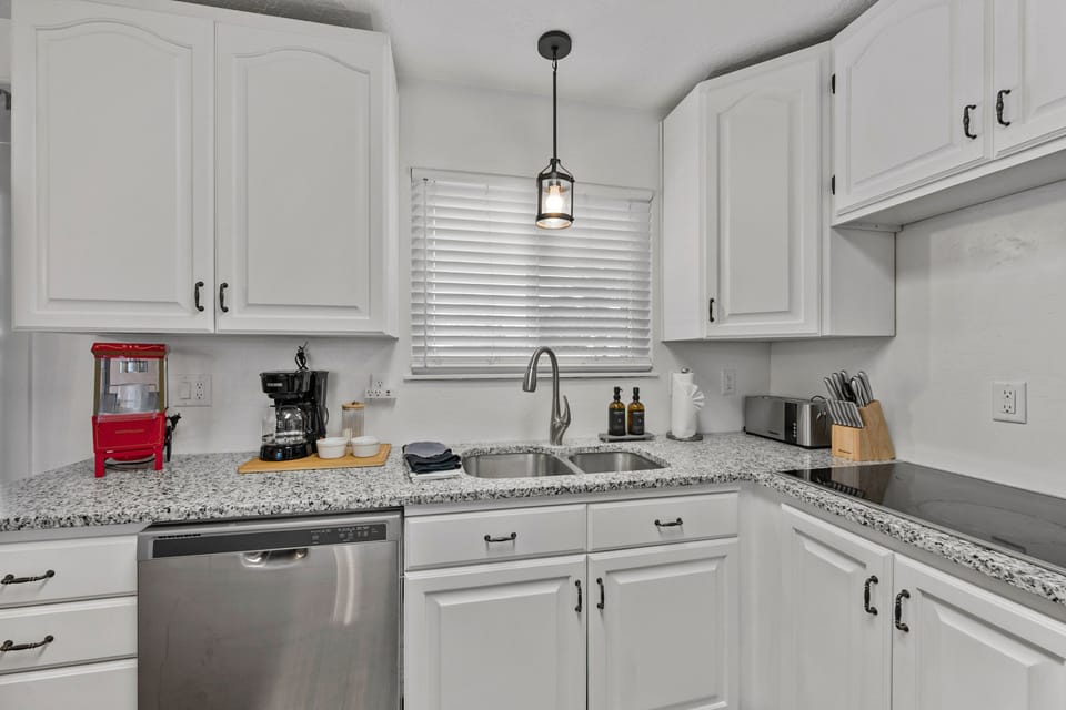 The kitchen is well appointed with service for up to 10 people, and just about every amenity you could need to prepare meals for large groups.
