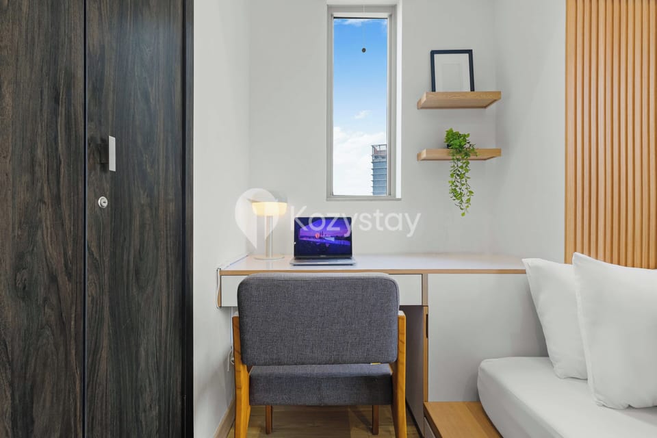 Apartment, 1 Bedroom, City View | Desk, laptop workspace, iron/ironing board, free WiFi