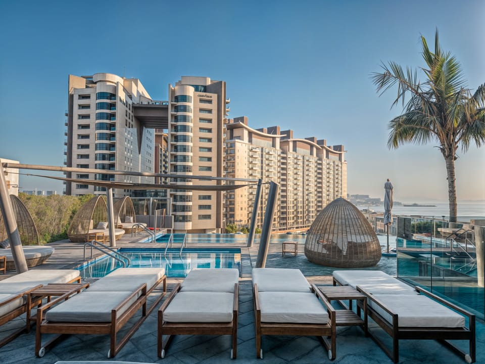 2 outdoor pools, pool umbrellas, sun loungers