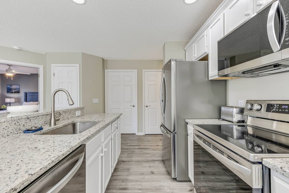 The kitchen is well-equipped with modern appliances and everything you need for easy meal preparation.
