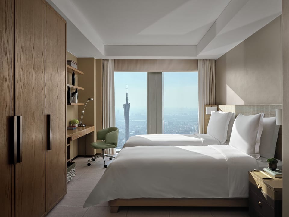 Suite, 2 Bedrooms (Canton Tower View) | Down comforters, in-room safe, desk, laptop workspace