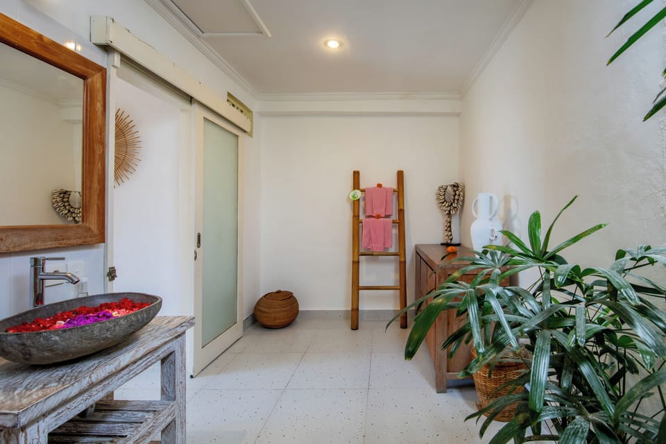 Shower, free toiletries, slippers, towels