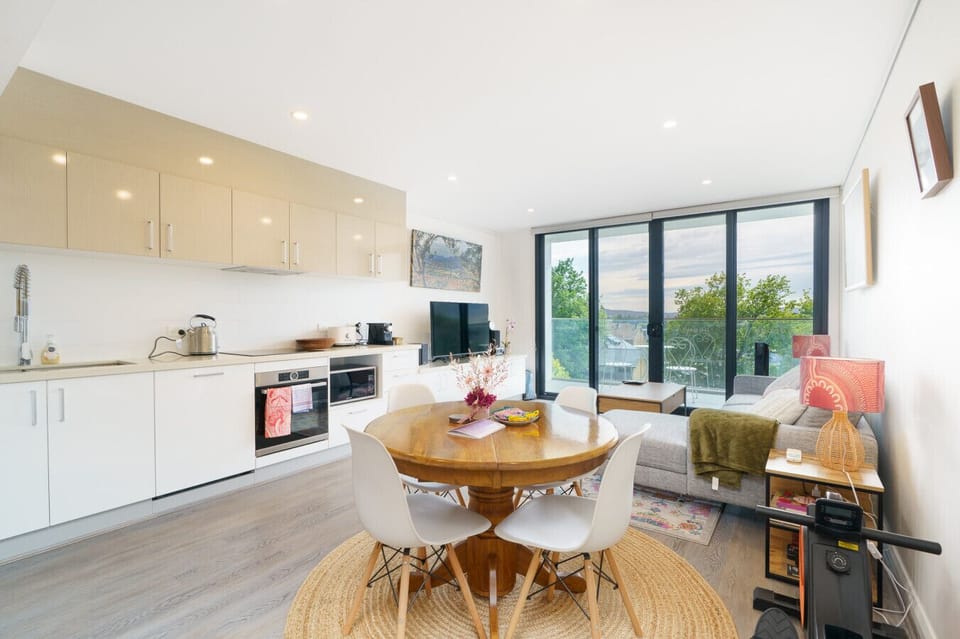 Comfort meets style in this open-plan living area filled with natural light