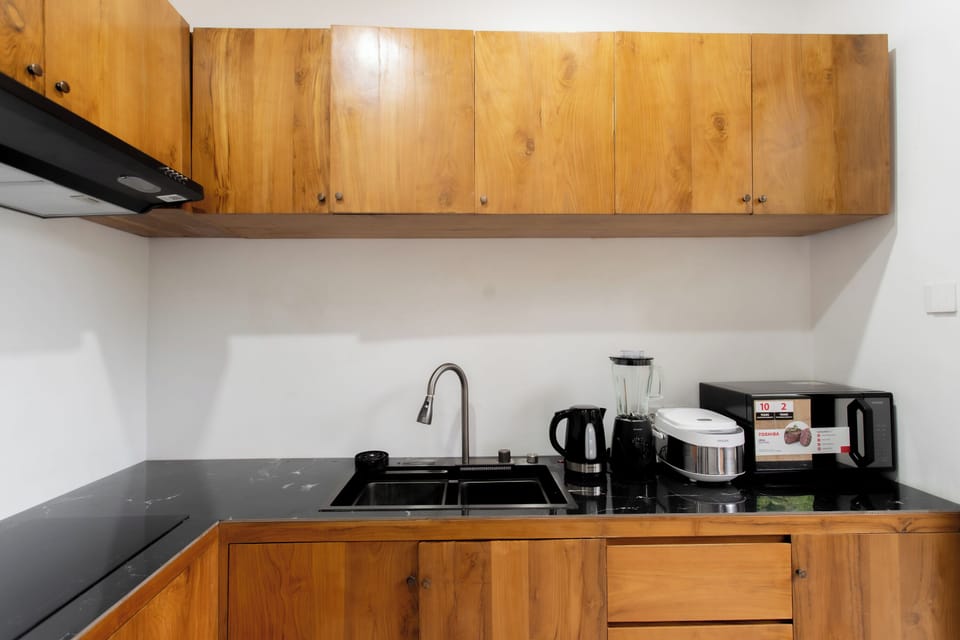Family Villa, 4 Bedrooms | Private kitchen | Electric kettle