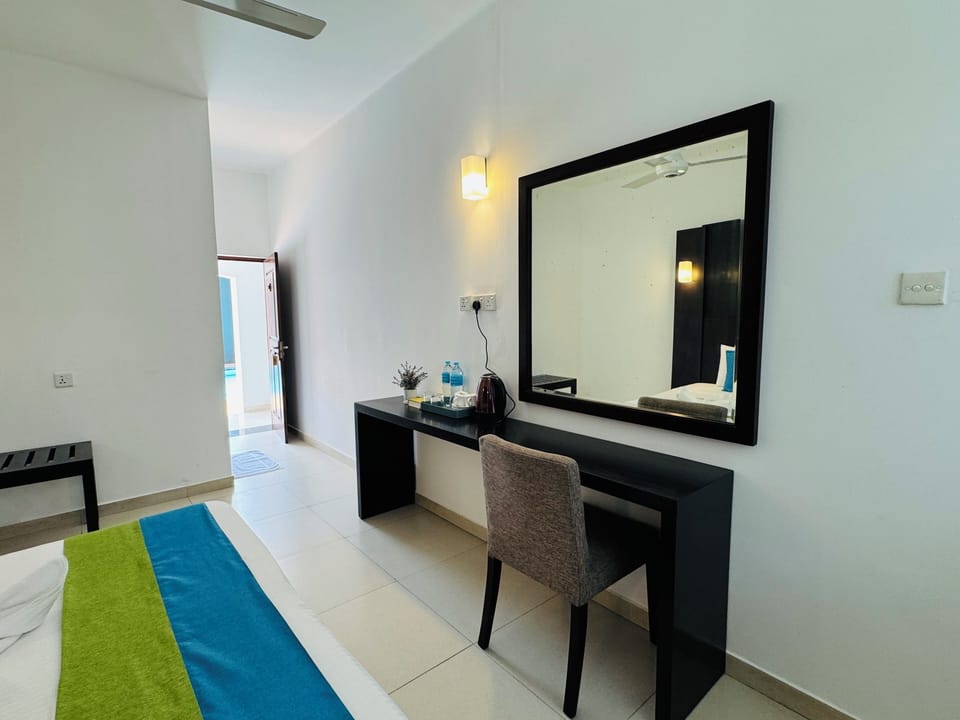 Basic Double or Twin Room | Living area | TV