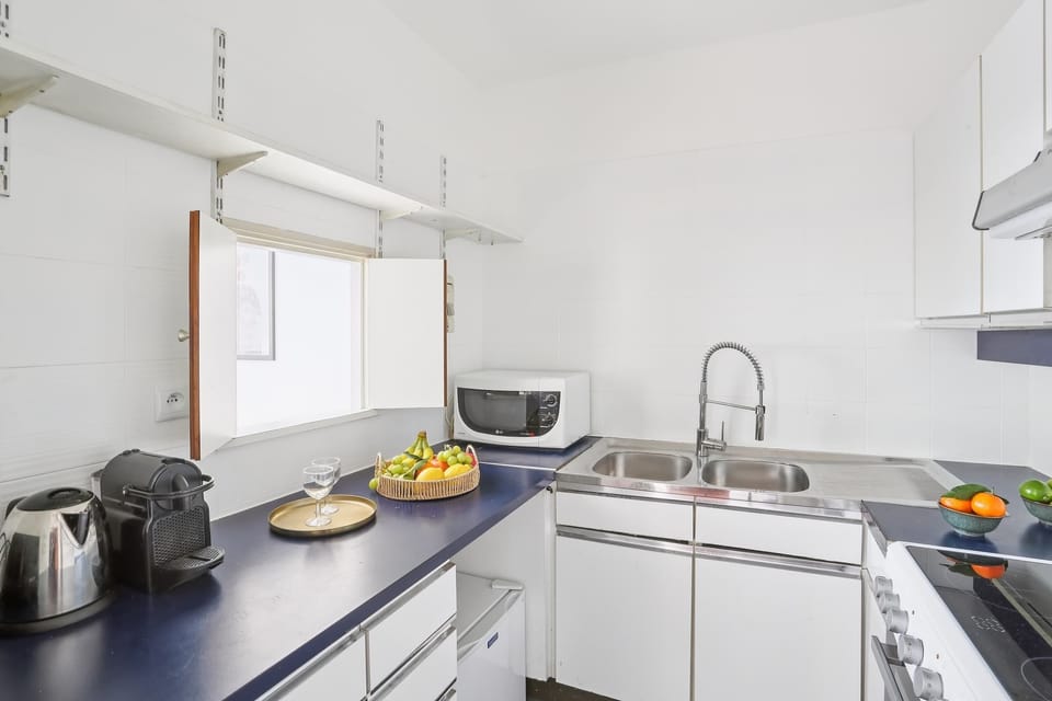 The kitchen is fully equipped to prepare a simple meal 