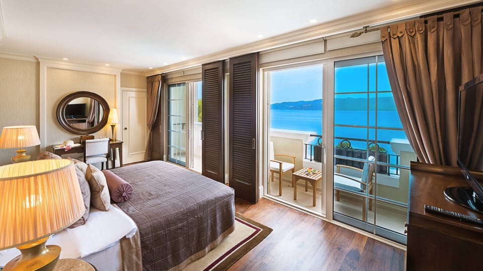 Family Room, Sea View | Free minibar, free WiFi, bed sheets