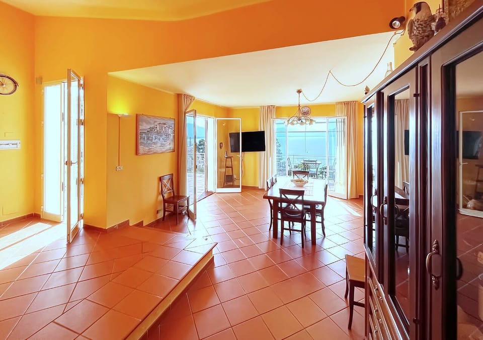 Villa, Sea View | Living area | 32-inch flat-screen TV with cable channels