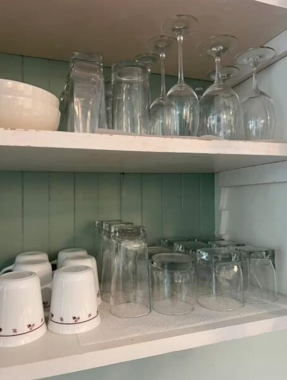 From morning coffee to evening wine, every glass and cup you need is right here — clean, organized, and ready for your stay.