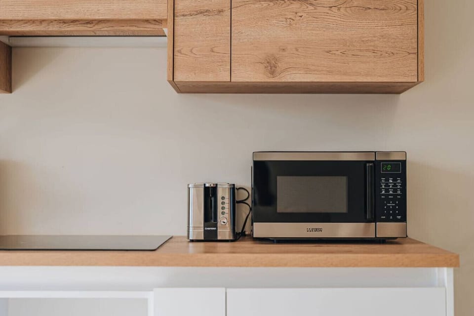 Microwave and toaster ready for use.