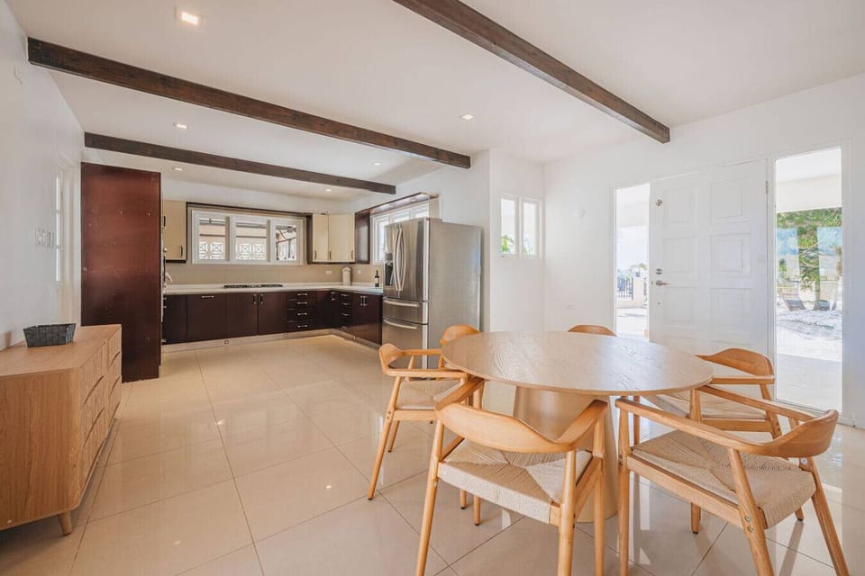 Modern kitchen and dining in one space.