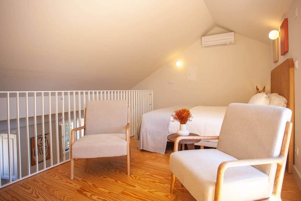 The mezzanine floor above the kitchen/dinning area functions like a second bedroom or primary place to sleep depending on your preferences. 