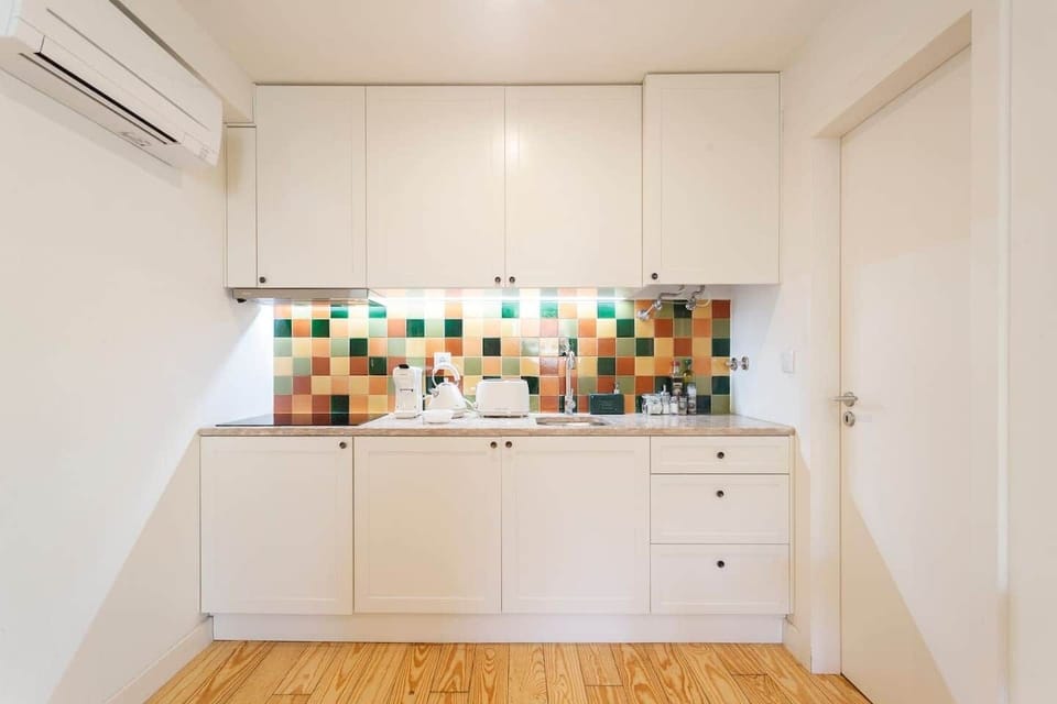 Well equipped kitchenette with all the basics to cook and eat comfortably; includes 4 hobs (hotplates), microwave, toaster, kettle and coffee machine. Also provide coffee, sugar, salt, oil, teabags and other basics.