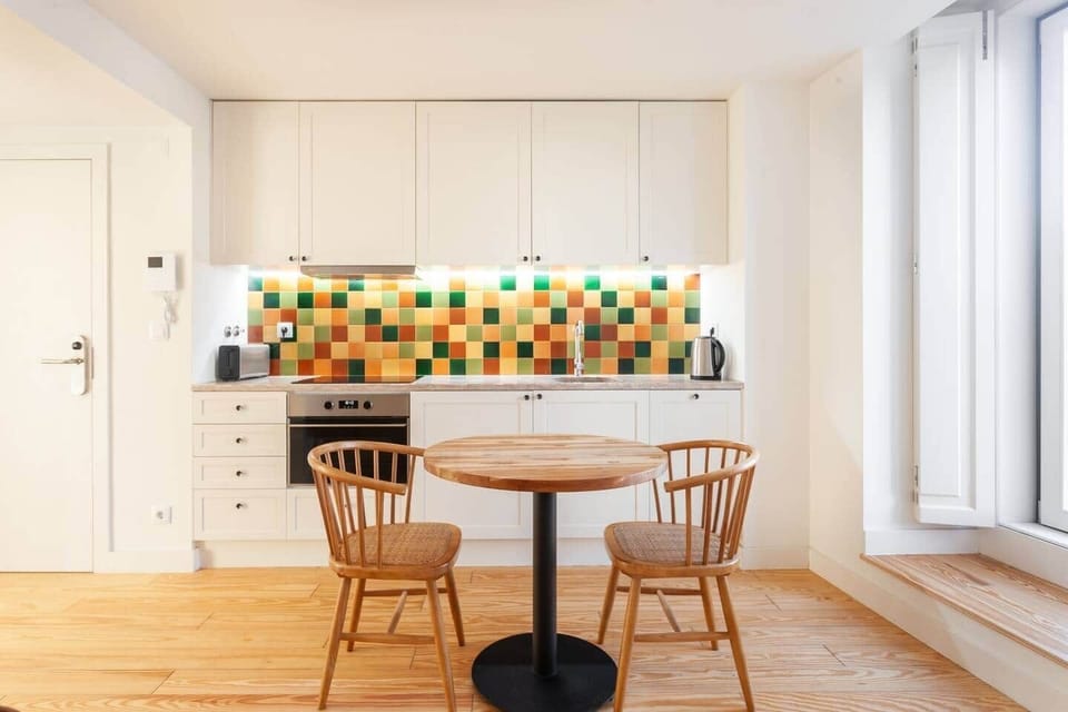 Comfortable for one to four people. The apartment also has wooden stools for extra seating, if hosting guests or larger groups.