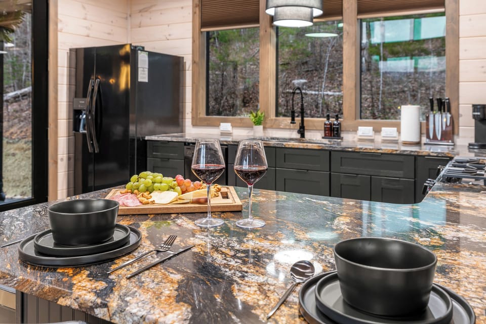 Prepare meals in the gourmet kitchen then enjoy at the bar top.
